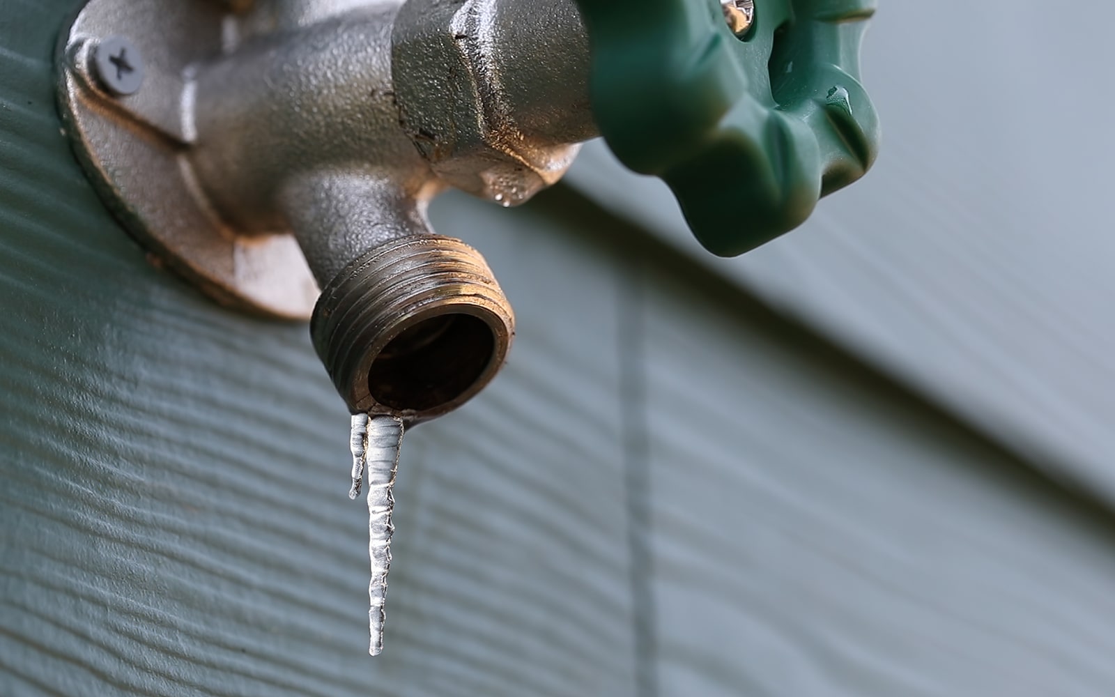 Preparing Your Pipes for Winter - Feature - frozen outdoor water spigot